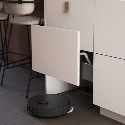 robot-aspirateur-dissimule-dans-meuble